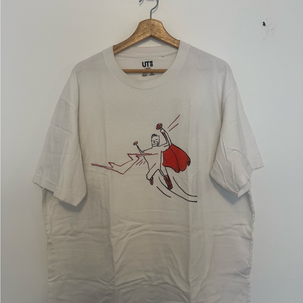Uniqlo Cream Tee with Red Superhero Design